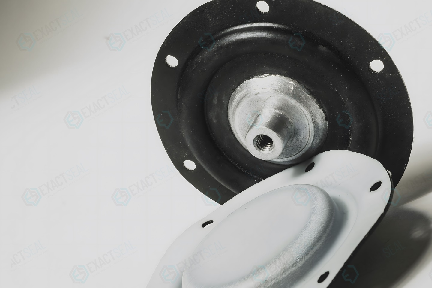 Metal to Rubber bonder parts: Diaphragms with Metal inserts, compliant rollers with metal bush, machine mounts with metal studs